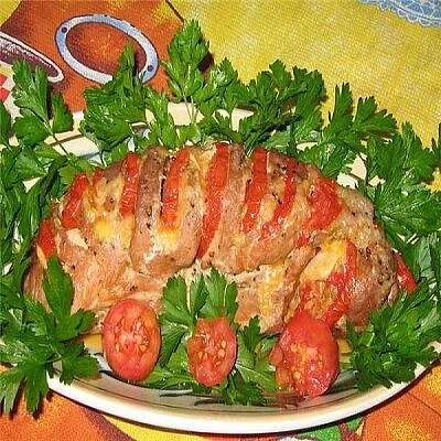 Свиная вырезка с помидорами и сыром